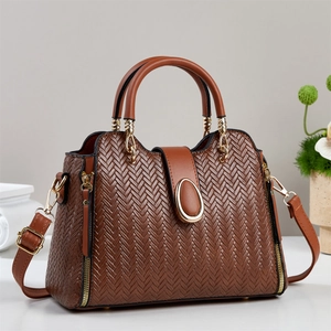 Brown woven texture tote bag with golden hardware and adjustable strap for women