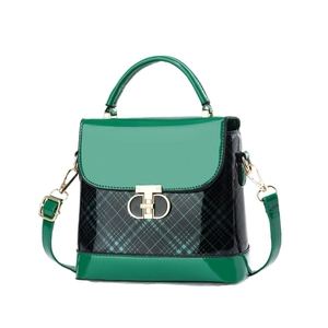 Green square crossbody bag with checkered patent leather and gold circular metal clasp