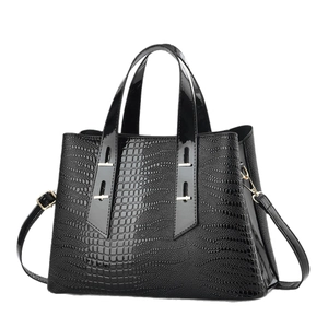 Fashionable black crocodile embossed leather tote bag with gold hardware and shoulder strap