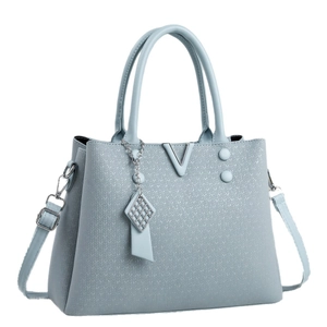 Light blue macaron handbag with knit texture, metal V-logo, and adjustable shoulder strap