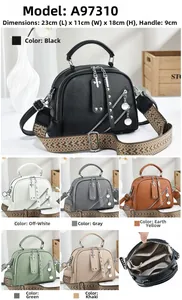 Sac en cuir grainé avec double fermeture éclair et bandoulière tressée en plusieurs couleurs