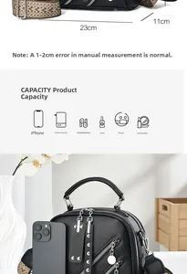 Vue détaillée du sac bandoulière en cuir noir montrant sa grande capacité de rangement