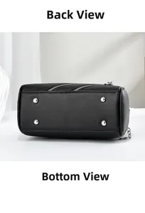 Détails du sac en cuir grainé noir montrant les clous de fond et les crochets en métal
