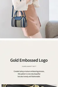 Detail of gold-tone zipper and anti-theft flap on striped canvas tote bag