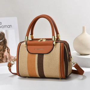 Retro contrast color canvas tote bag with brown leather trim and top handles