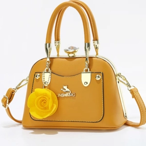 Yellow faux leather handbag with floral charm and gold cat logo crossbody bag for women