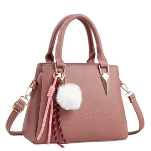 Dusty rose lychee texture tote bag with plush charm and adjustable shoulder strap