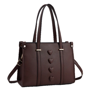 Dark brown leather bucket bag with 3D heart charms and adjustable shoulder strap