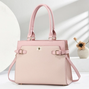 Elegant pink PU leather tote bag with woven texture and gold twist lock for women