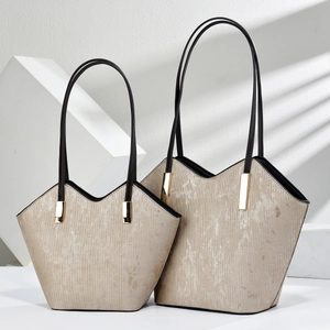 Chic beige textured oil leather tote bags with V-shaped opening and gold hardware details
