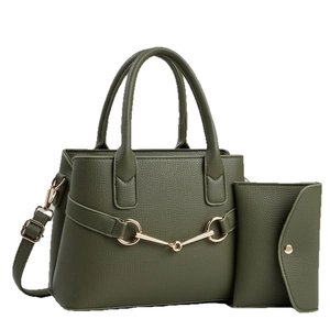 Dark green pebbled faux leather tote bag set with golden hardware and matching wallet