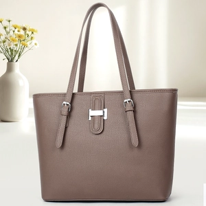 Coffee brown lychee textured leather tote bag with silver H-shaped metal buckle detail