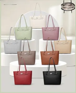 Litchi pattern leather tote bags in various colors displayed on white pedestals