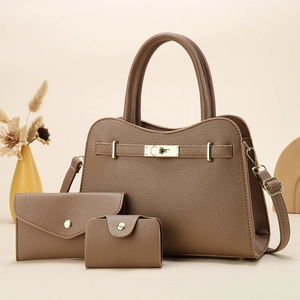 Three-piece vintage coffee brown leather handbag set with matching wallet and card holder