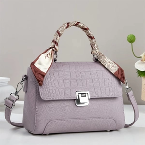 Purple litchi leather handbag with crocodile pattern flap and silk scarf handle wrap
