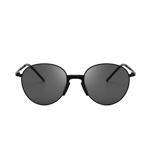 Classic oval metal frame sunglasses with dark grey lenses in a minimalist retro style