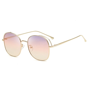 Fashionable oversized round hollow metal sunglasses with purple to orange gradient lenses