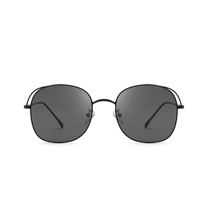 Classic metal hollow-out sunglasses with black frame and dark grey rectangular lenses