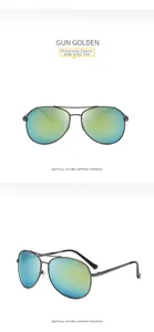 Close-up of gunmetal aviator sunglasses with gold reflective lenses and metal frame