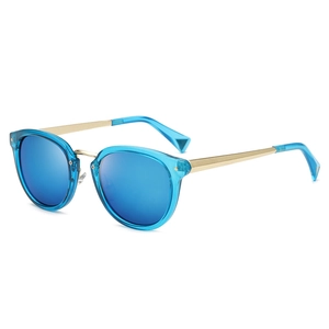 Retro round transparent blue sunglasses with gold metal temples shown at a 45-degree angle