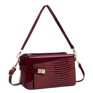 Chic dark wine red crossbody bag in glossy patent and crocodile embossed leather
