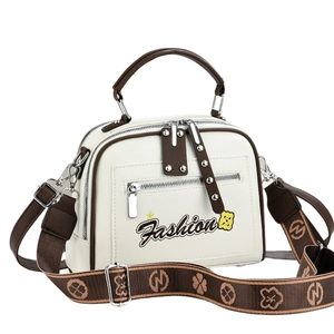 Chic beige crossbody bag with brown trim and embroidered Fashion logo and starry strap