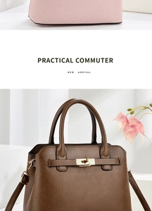 Close-up of luxury commute handbag featuring golden metal lock and delicate leather texture