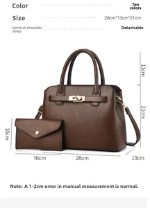 Detailed view of dark brown tote set with dimensions 28x13x21cm and golden hardware