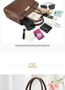 Spacious dark brown leather tote showing interior storage for phone, umbrella and camera