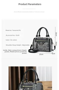 Detail view of retro Boston bag showing 23cm length and premium PU leather material