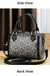 Detail showing side and back view of the black and white Boston leather handbag with gold hardware