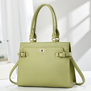 Minimalist light green lychee faux leather tote bag with gold twist lock and shoulder strap