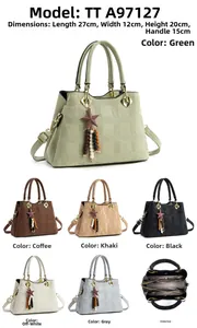 Close-up of checkered embossed PU leather handbag featuring star and wood bead charm