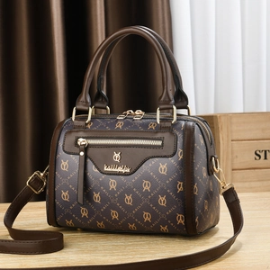 Classic dark brown monogram Boston bag with gold hardware and dual top handles