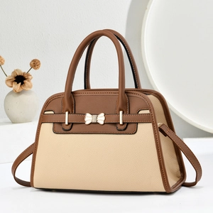 Sac fourre-tout bicolore en cuir grainé avec boucle en forme de nœud doré élégant