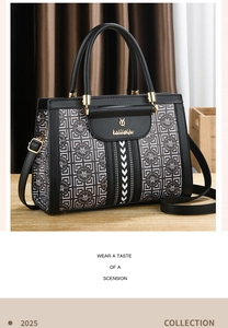 Detail of the golden metal logo and buckle on the black leather tote bag with pattern