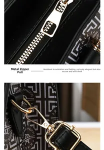 Detailed view of durable golden zippers and metal clips on black leather bag