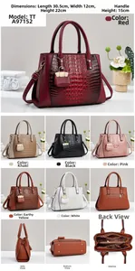 Detailed view of crocodile pattern handbag with dimensions 30.5x12x22cm and color options
