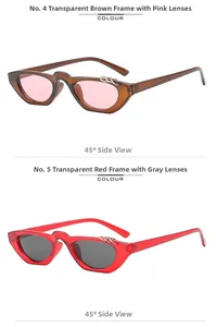 Détail de lunettes œil de chat avec anneaux métalliques en montures thé et rouge