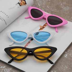 Stylish cat eye sunglasses for women with pink white and black frames and tinted lenses