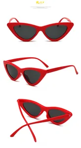 Multiple views of red cat-eye sunglasses featuring grey lenses and folding design