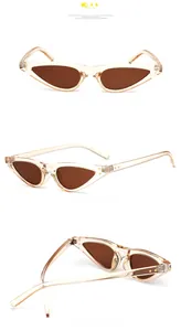 Detailansicht von vorne und der Seite einer Vintage-Cat-Eye-Sonnenbrille mit orangefarbenem Rahmen