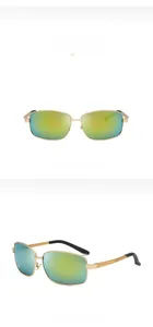 Macro view of gold aluminum frame sunglasses with yellow-green polarized lenses for men