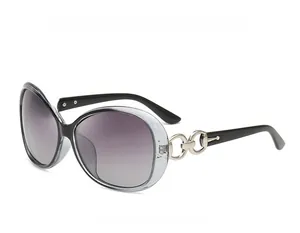Macro view of transparent black oversized sunglasses frame with decorative metal rings