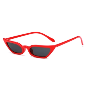 Retro cat eye sunglasses with bright red frames and dark lenses for a vintage chic look