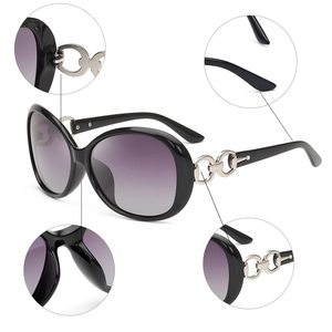 Women's butterfly sunglasses with black frame, purple gradient lenses and silver chain
