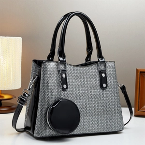 Chic women's grey woven crossbody bag with black patent leather trim and round coin purse