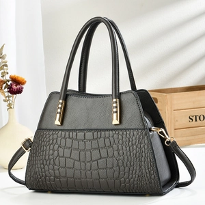 Women's charcoal tote bag featuring crocodile embossed leather and golden hardware details