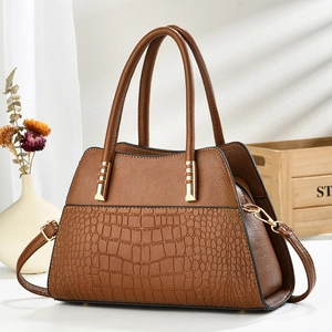 Brown embossed crocodile leather tote bag with top handle and detachable shoulder strap