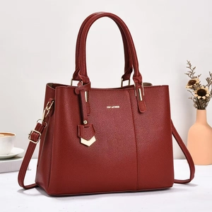 Elegant burgundy lychee pattern leather handbag with adjustable strap for women